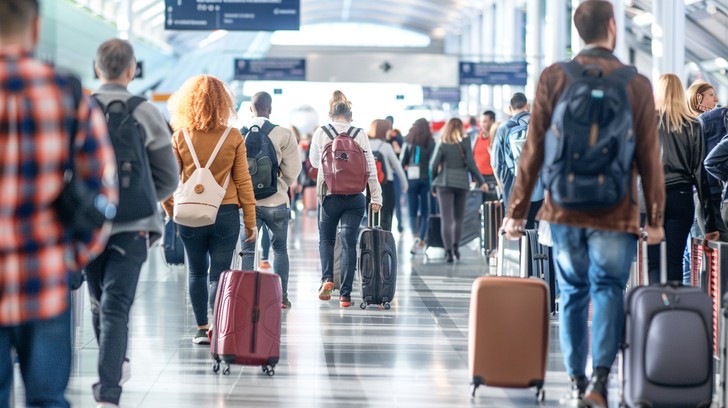 Corporate traveler at an airport for India business flights